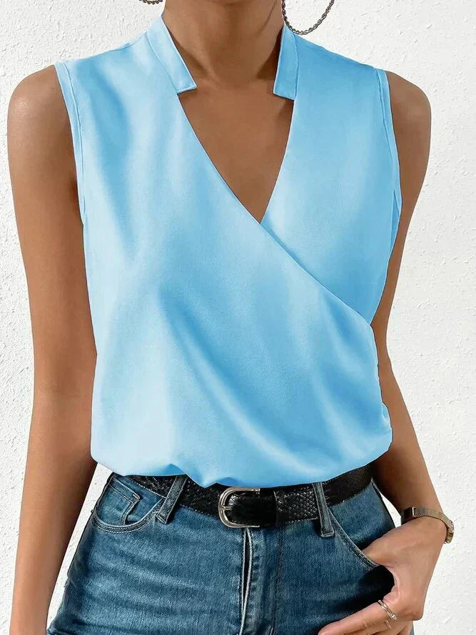 Women's elegant sleeveless blouse. Lightweight, breathable top for summer fashion, easily dressed up or down.