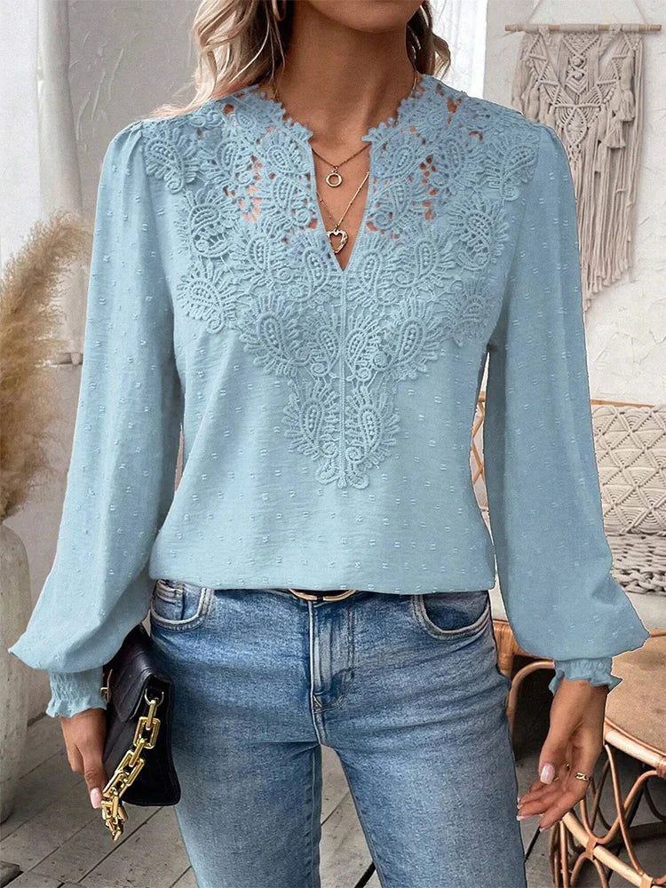 Flowy women's summer blouse in a chic design, ideal for office attire or casual wear.