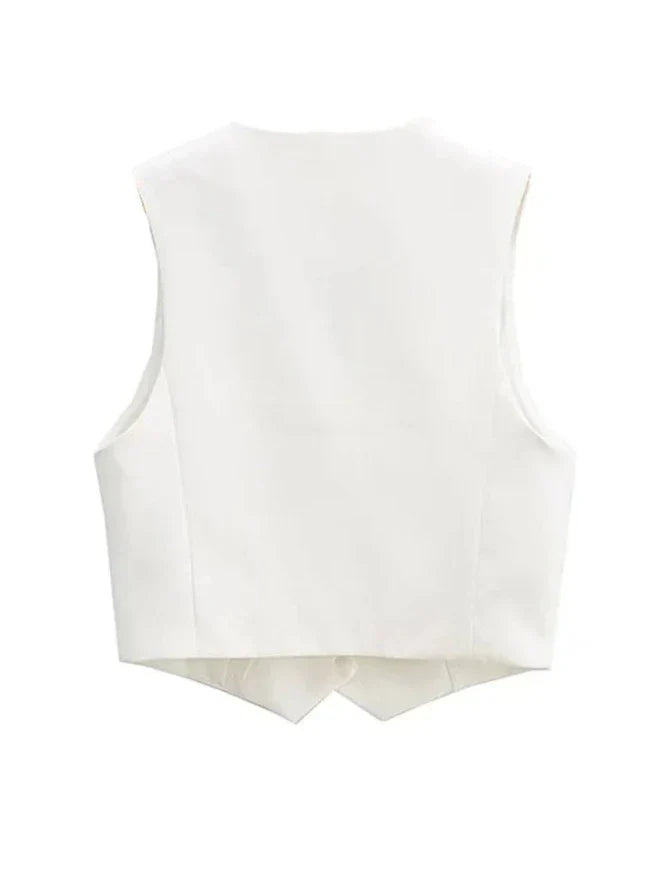 Modern women's tailored vest, a versatile wardrobe staple. Ideal for creating chic formal or casual ensembles.