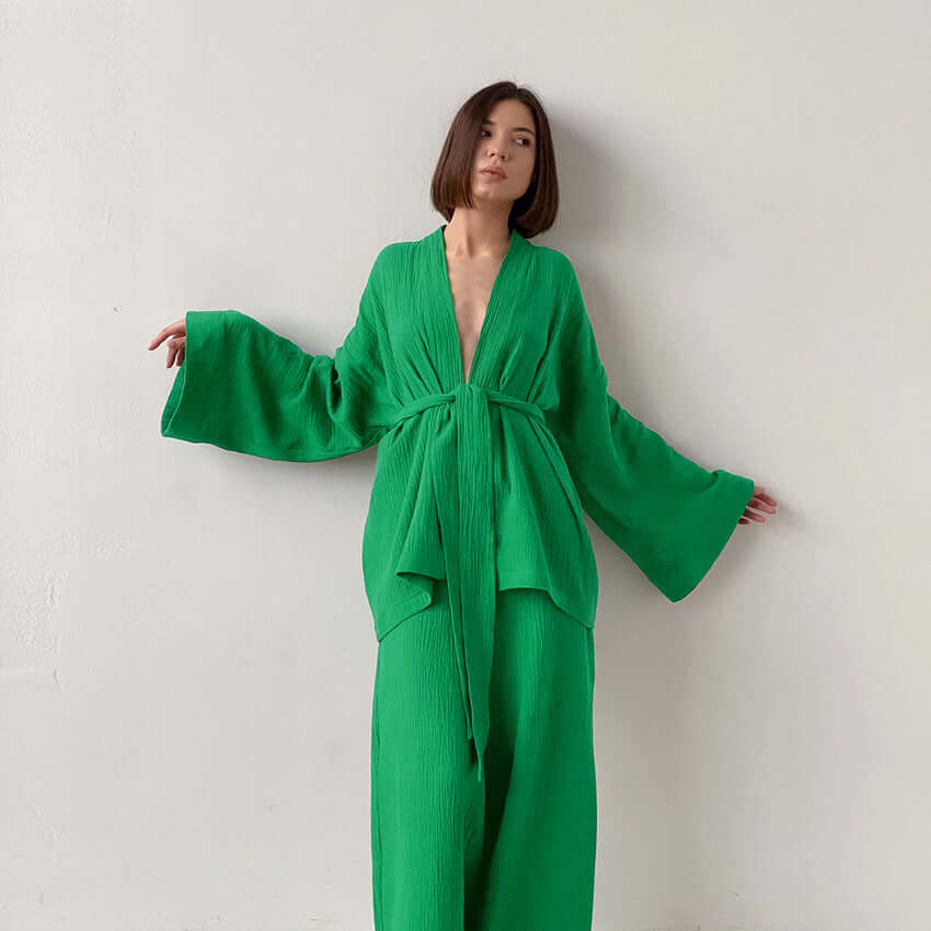 Chic women's two-piece set: V-neck top & wide-leg trousers. Elegant & comfortable for summer/spring casual wear.