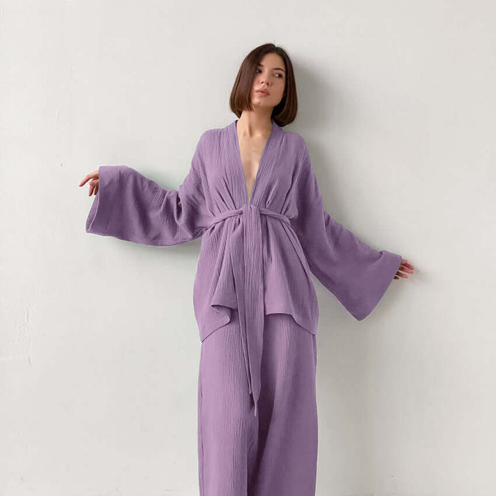 Comfortable women's lounge wear set: V-neck top & wide-leg trousers. Perfect versatile casual or elegant outfit.