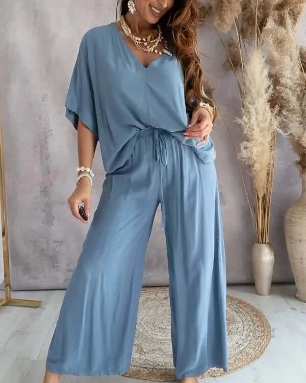 Chic women's two-piece summer set, lightweight & breathable, perfect for warm weather vacation or casual wear.