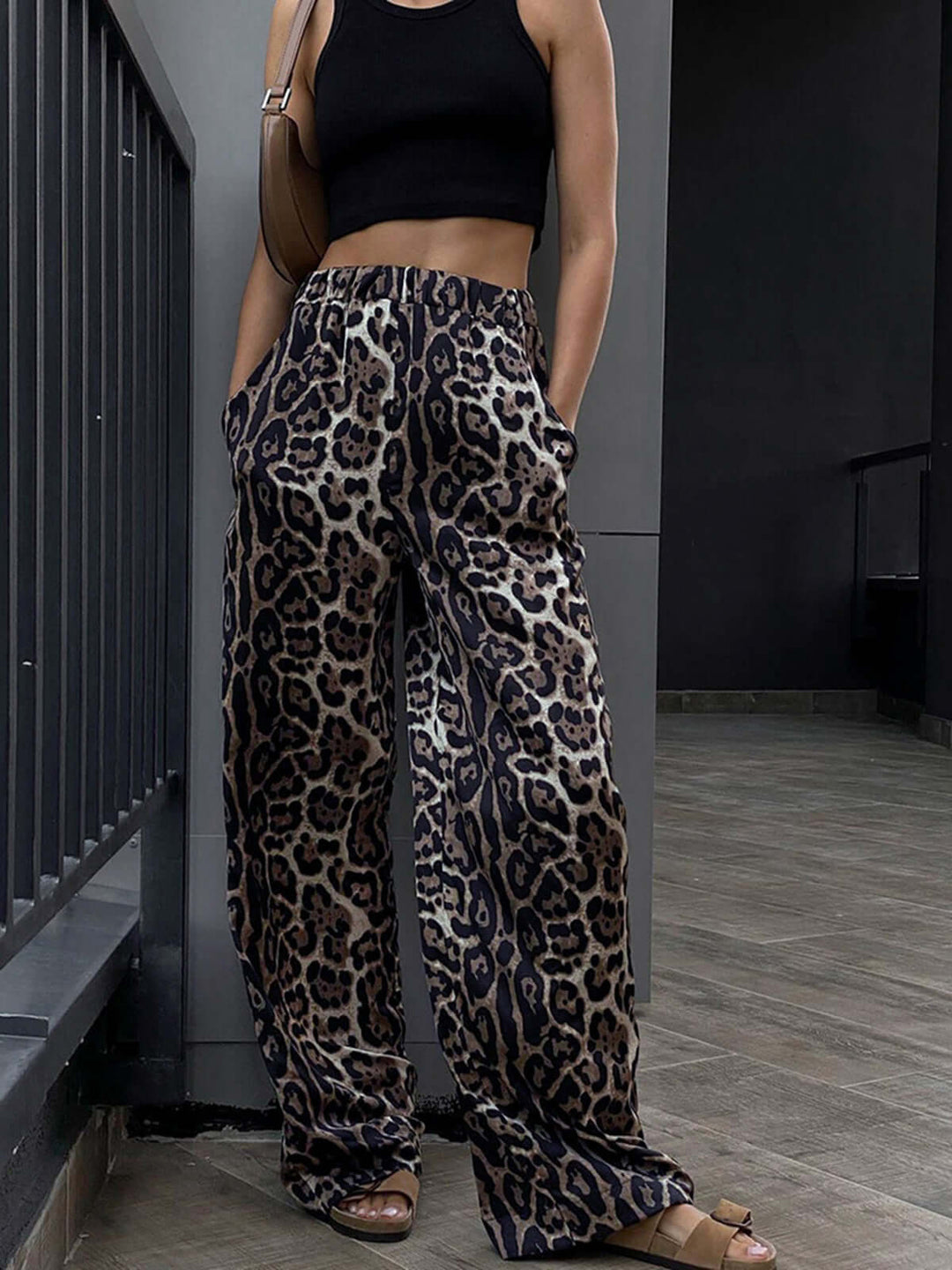 Chic women's wide-leg animal print trousers, perfect for versatile fashion and effortless style.
