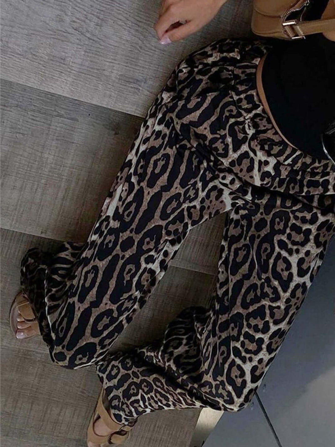 Bold animal print wide-leg trousers for women, offering a fashionable statement piece with ultimate comfort.