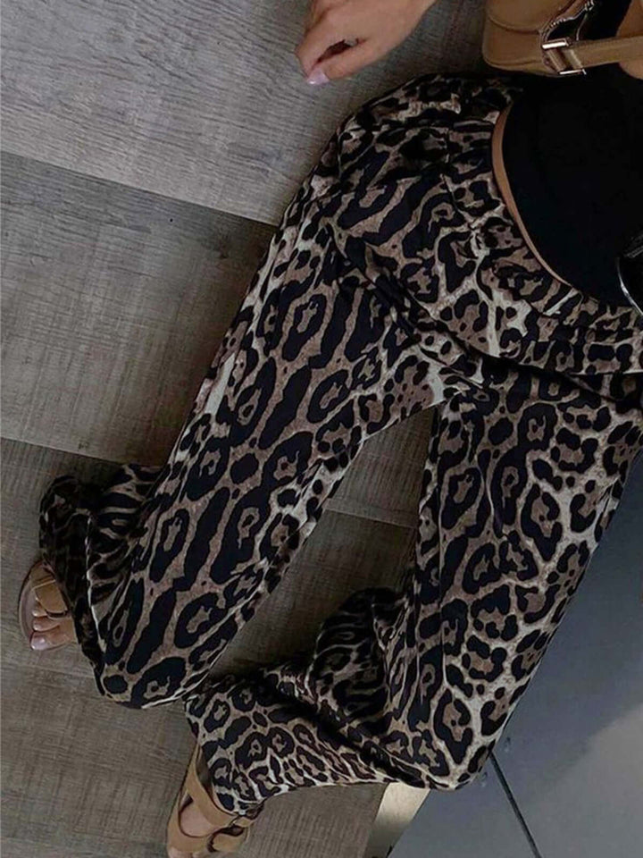 Bold animal print wide-leg trousers for women, offering a fashionable statement piece with ultimate comfort.