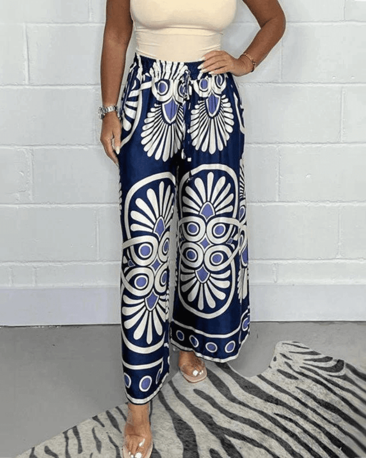 Versatile women's wide-leg printed pants, great for chic casual wear or elegant spring/summer outfits.