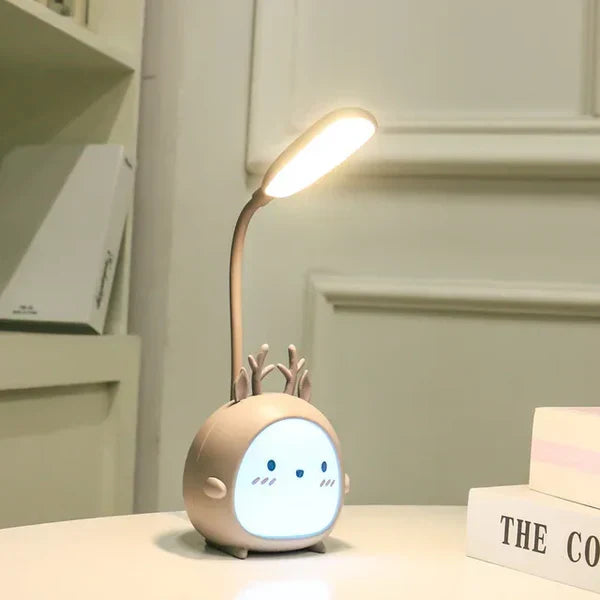 Cartoon deer portable USB lamp, a child-friendly eye protection reading light for kids' bedroom.