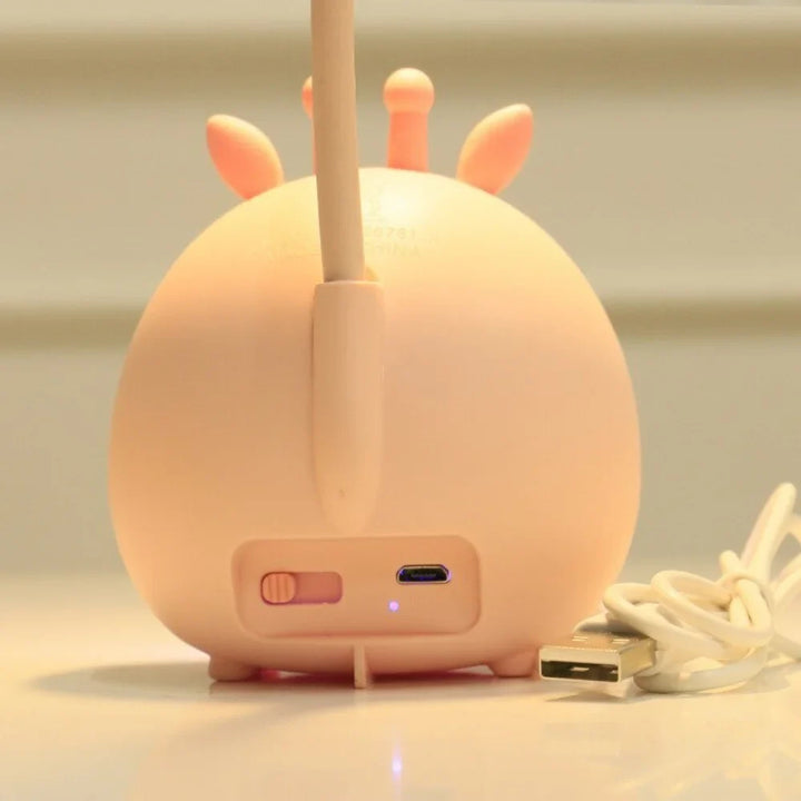 Adorable cartoon deer USB reading lamp for kids, featuring eye protection and a soft night light function.