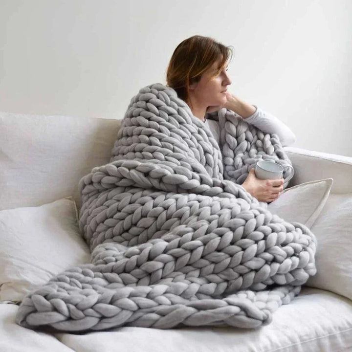 Soft chunky wool yarn for DIY blankets, ideal for knitting and creating handmade gifts.