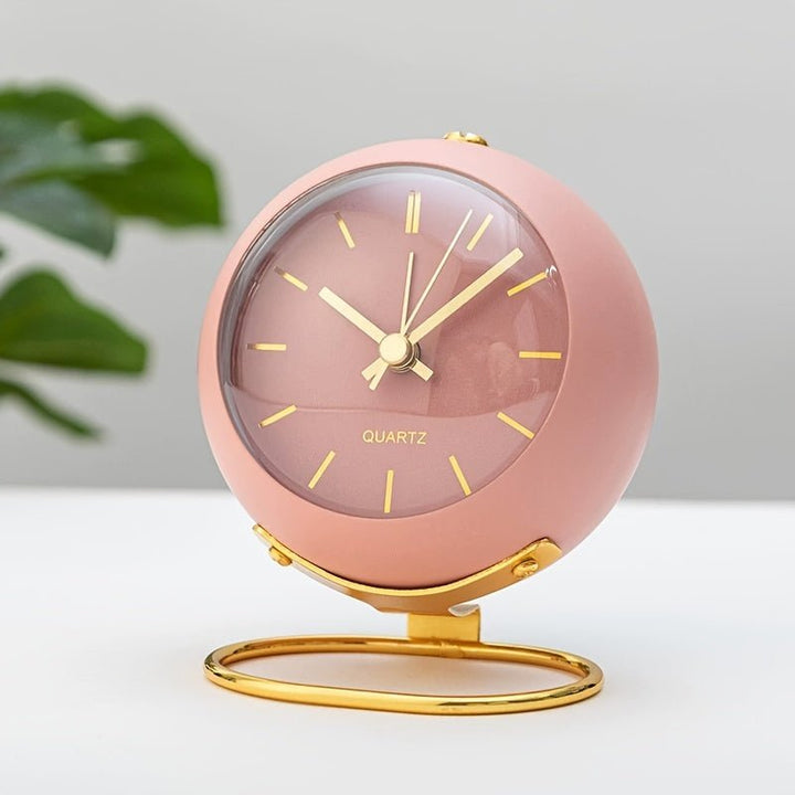 Perfect gift: classic analog alarm clock for bedroom or desk. Features loud bell, retro design, battery operated.