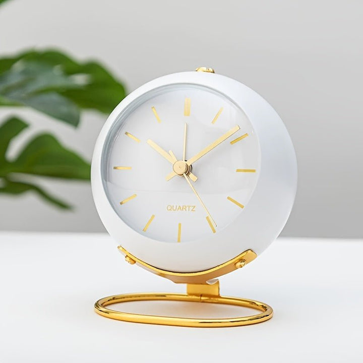 Traditional analog alarm clock with a classic retro look. Loud twin-bell alarm ensures you wake up. Great for decor.
