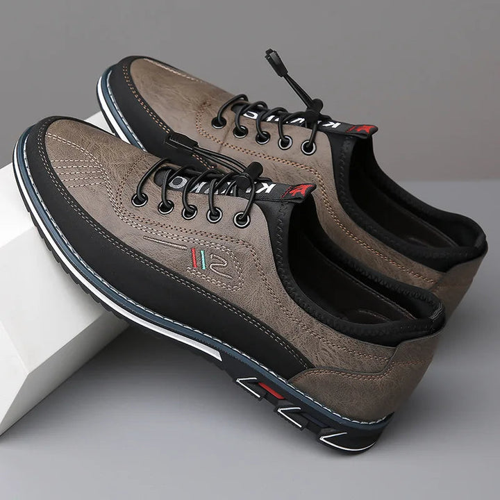 Full shot of men's elegant black leather oxford shoes, designed for ultimate comfort and sophisticated formal fashion.