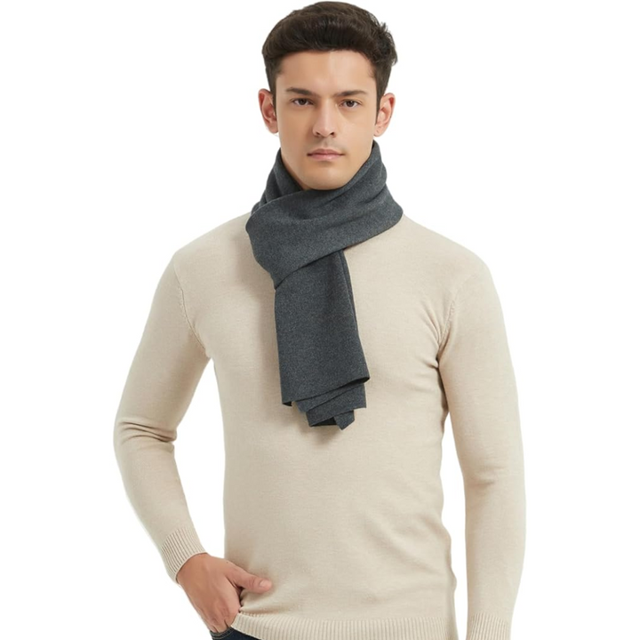 Luxurious men's cashmere winter scarf in charcoal, offering ultimate warmth and sophisticated style.