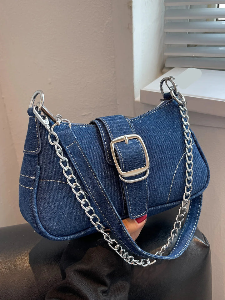 Classic dark blue women's buckle two-way shoulder handbag, versatile for everyday use.