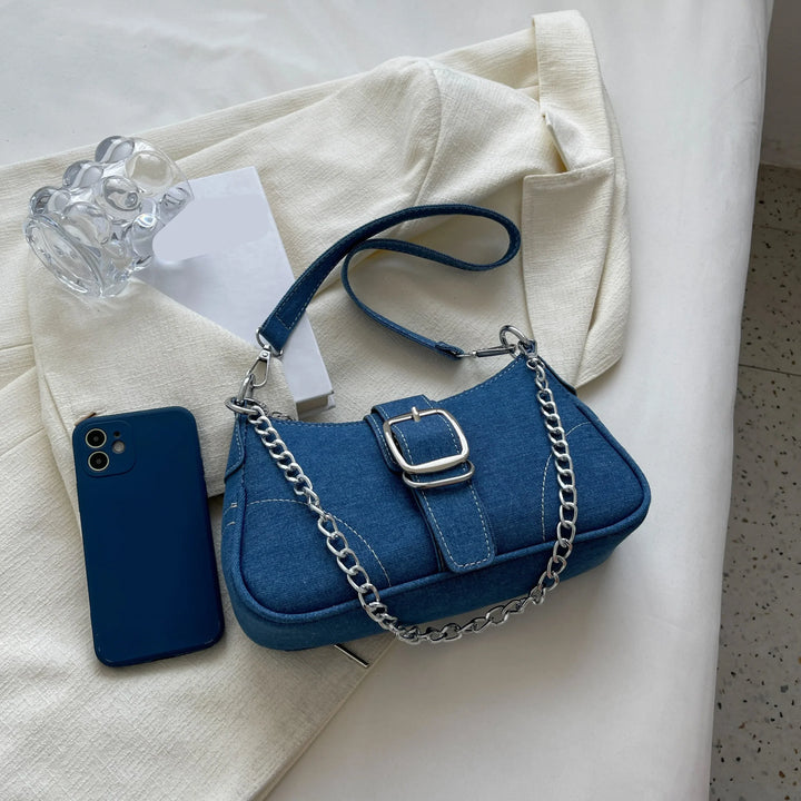 Two-way dark blue women's shoulder bag with stylish buckle, a versatile handbag for any occasion.