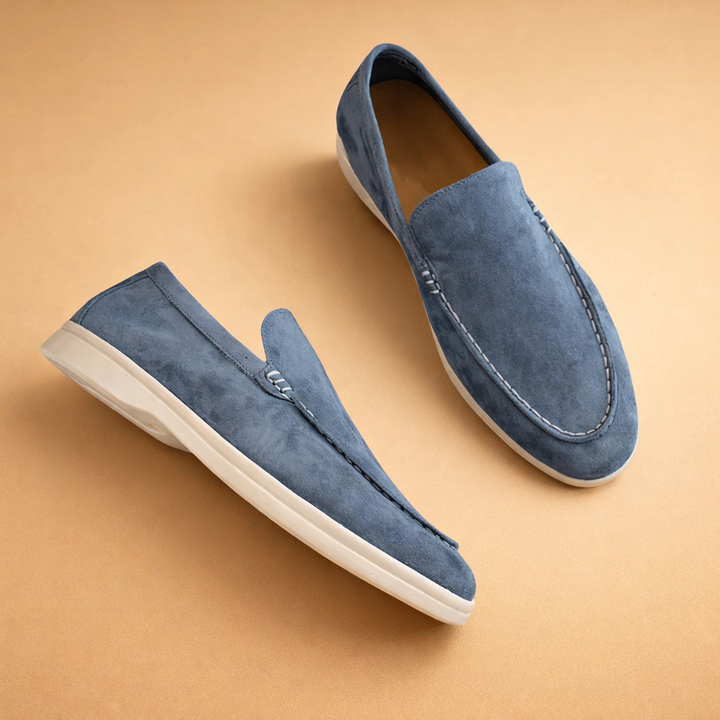 Classic men's brown slip-on penny loafers for effortless style & comfort. Versatile casual & office wear.