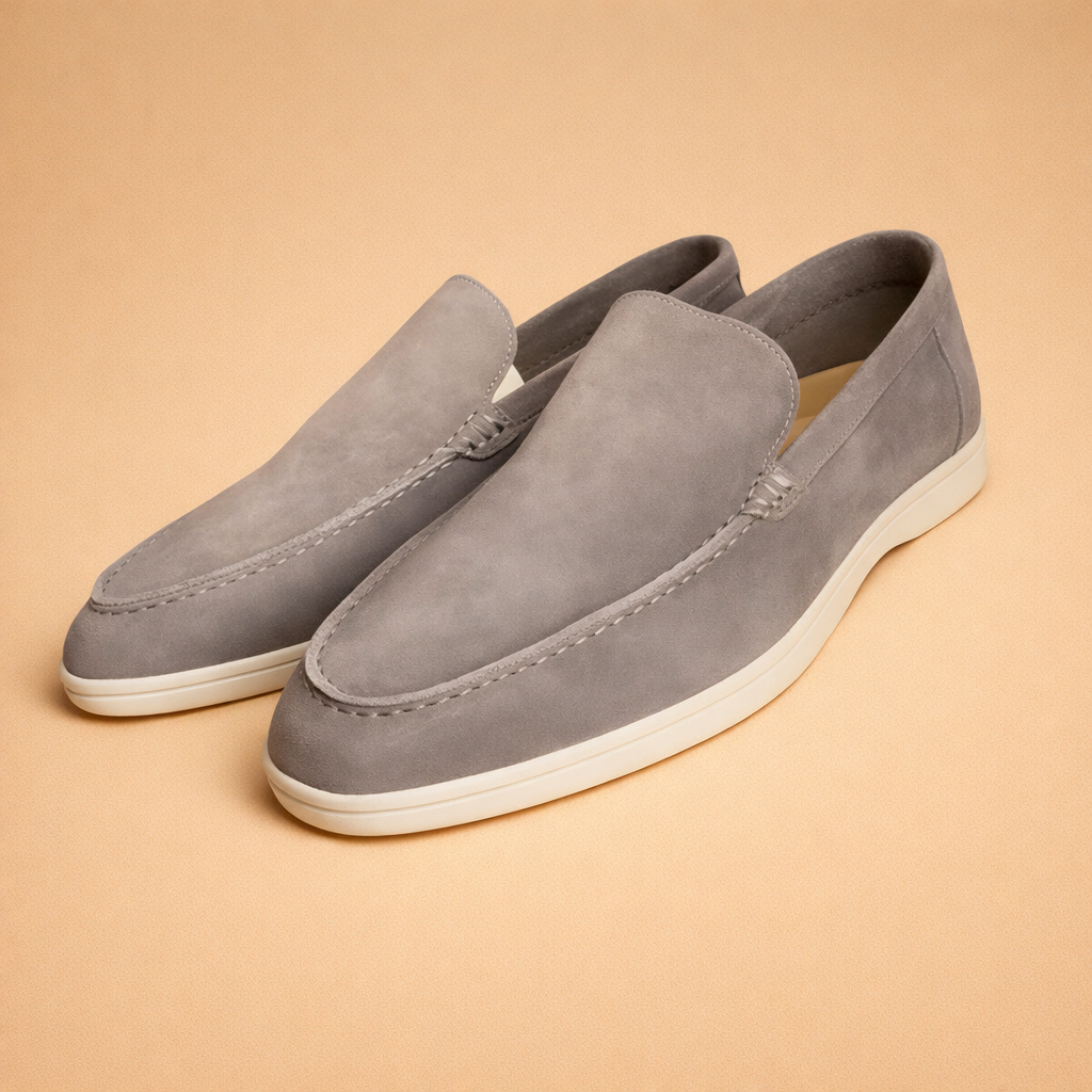 Versatile men's brown penny loafers, ideal for both casual outfits & smart office wear. Easy slip-on.