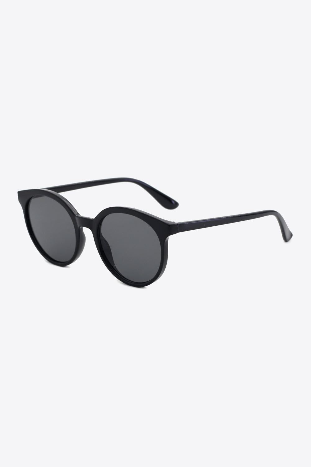 Trendy women's classic round sunglasses, UV400 sun protection, tinted lenses.
