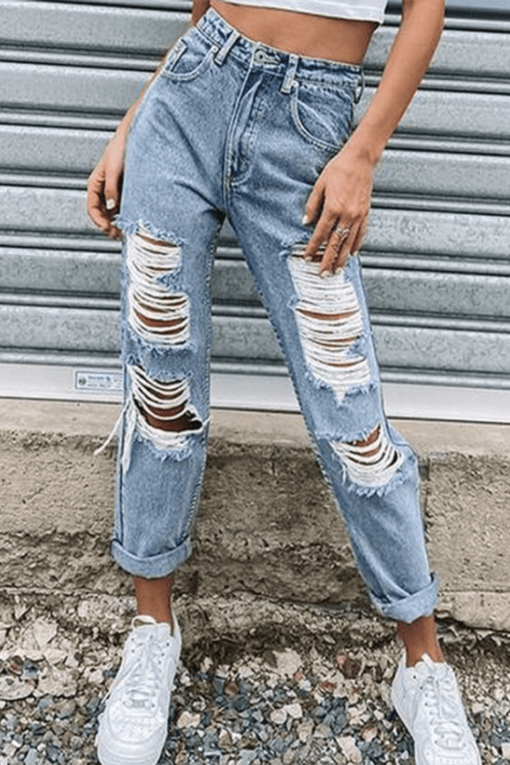 Classic women's straight leg blue jeans, comfortable denim for a flattering and versatile casual look.