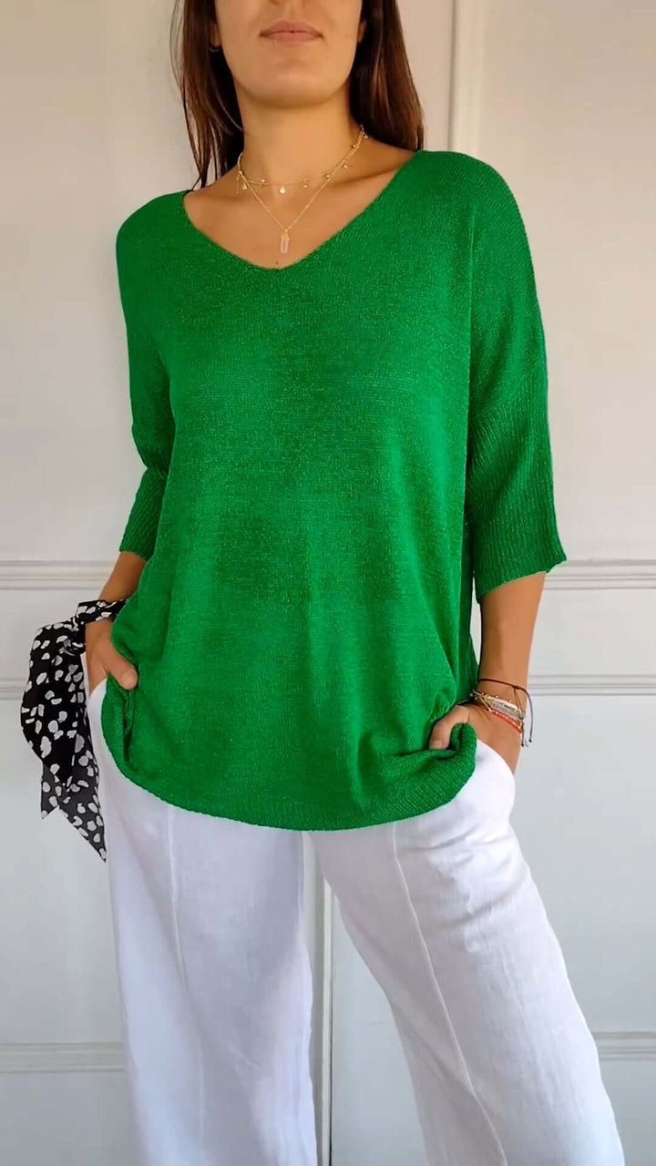 Relaxed long sleeve V-neck knit top for women, offering supreme comfort and casual elegance for daily wear.