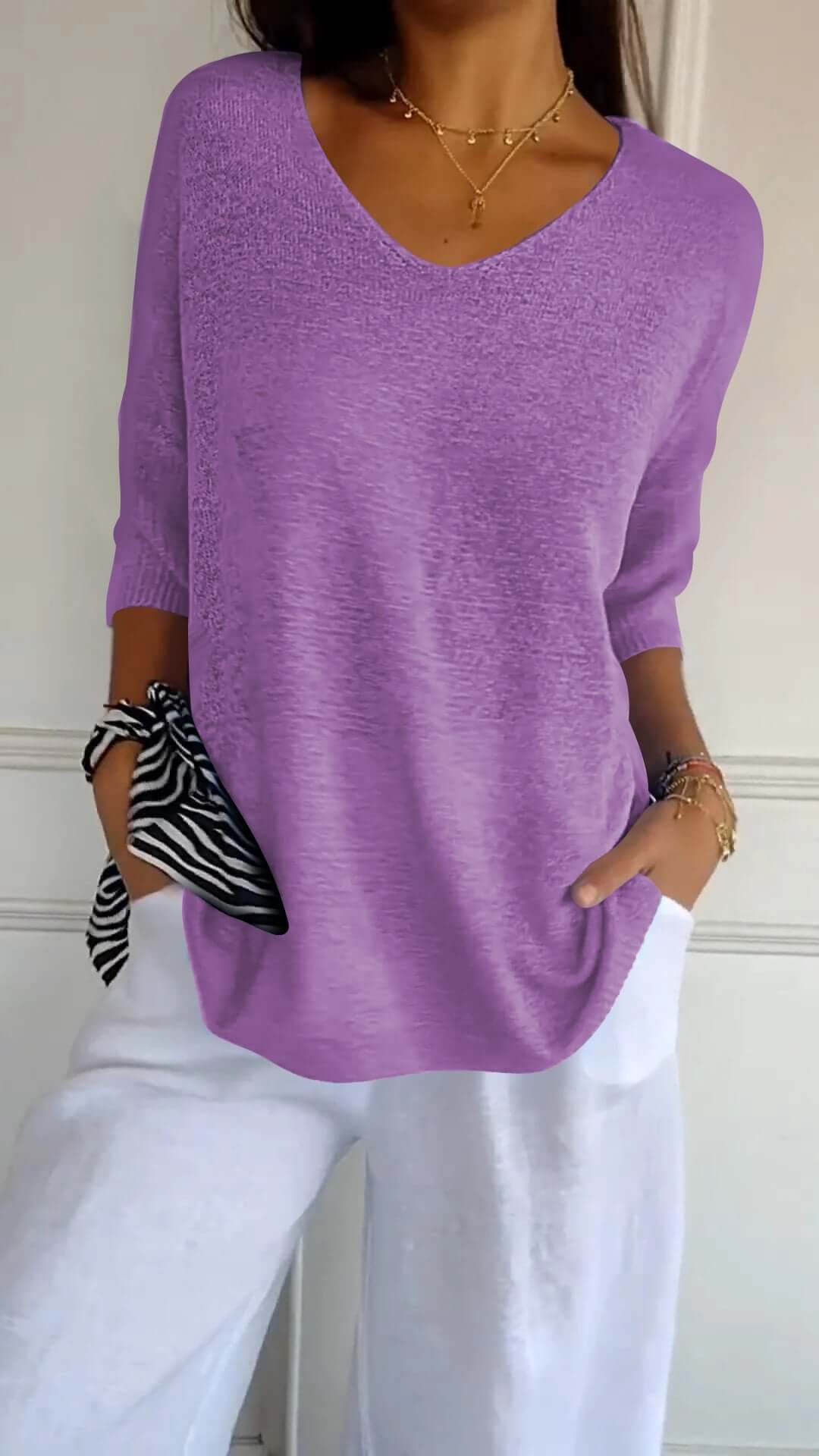 Effortless women's V-neck knit top, long sleeves, soft and comfortable for daily casual and stylish outfits.