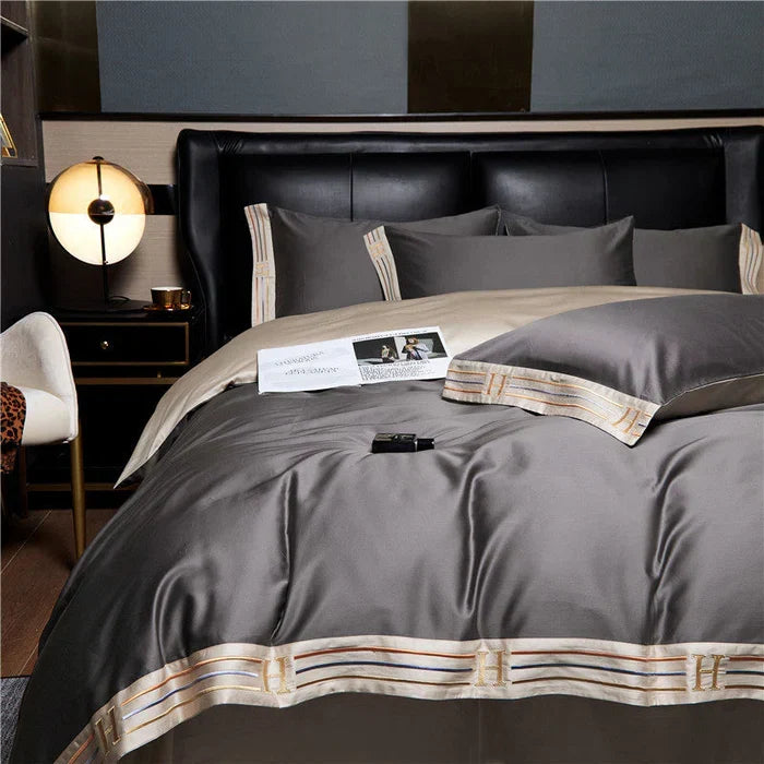 Close-up of elegant embroidered cotton duvet cover, luxury bedroom decor for comfortable sleep.