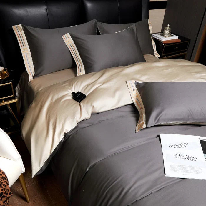 Full view of stylish embroidered cotton bedding set with matching pillowcases, all-season comfort.
