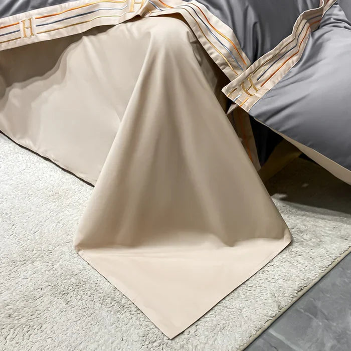 Luxury embroidered cotton bedding set, complete with duvet cover & two pillowcases for restful sleep.