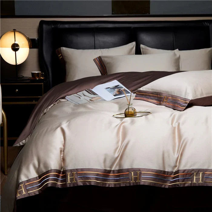 Stylish embroidered cotton bedding for a chic bedroom, offering ultimate comfort & elegance.