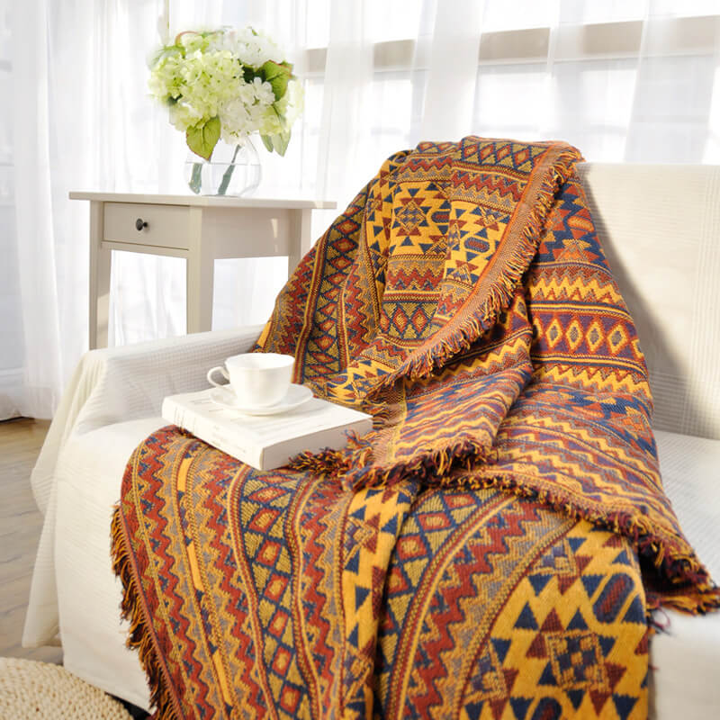 "Colorful bohemian tassel knitted sofa throw, featuring bright patterns and ethnic tassel details for vibrant home decor."