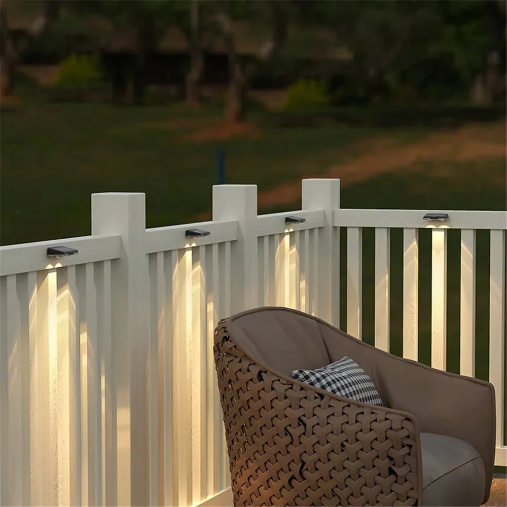 Solar Fence Lights: Vibrant 7-color LED outdoor wall lights, perfect for gardens and patios. Features auto on/off, wide LED lens, and weatherproof IP65 rating. Easy screw or adhesive installation.