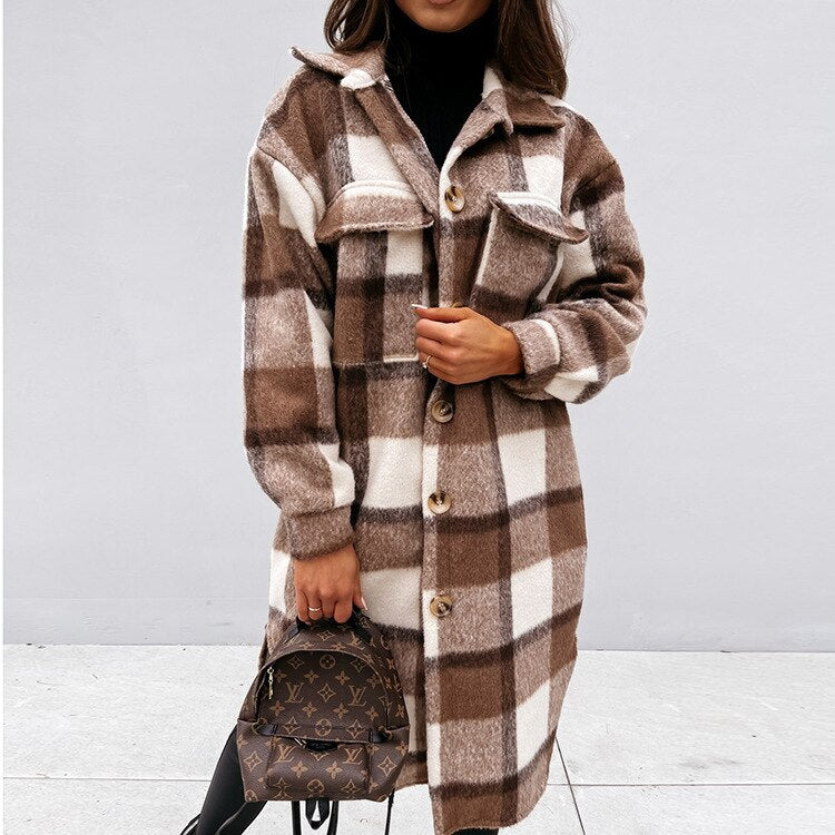 Stylish women's long plaid coat. Elegant and warm winter outerwear for fashion-conscious comfort.