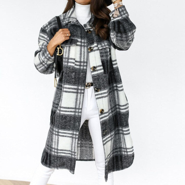 Warm & comfortable women's long checked coat, perfect for winter. Stylish plaid pattern outerwear.