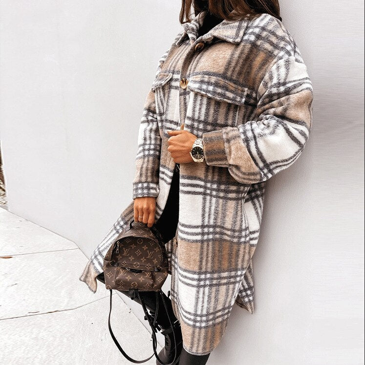 Elegant women's long plaid coat. Comfortable and warm checked winter outerwear for stylish fashion.