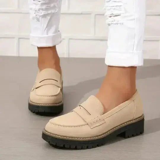 Comfortable women's black chunky loafers, perfect slip-on shoes for everyday wear and autumn fashion.