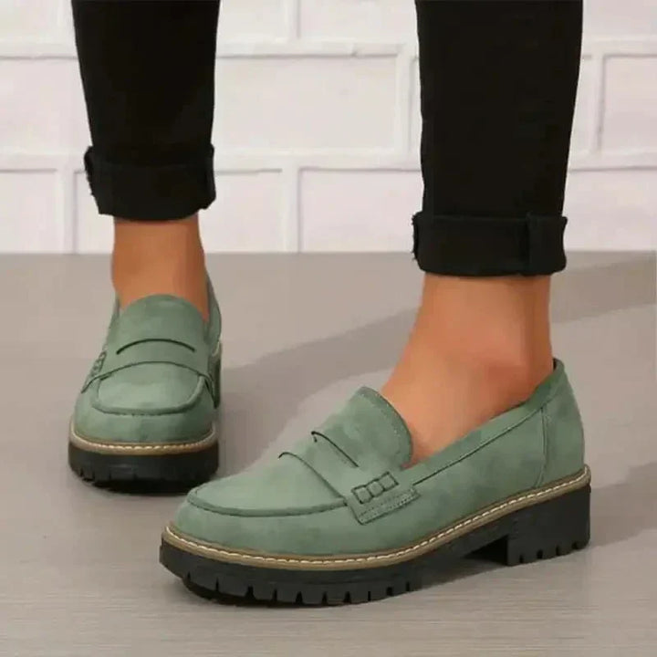 Fashionable women's chunky slip-on loafers, offering comfort and style for versatile daily wear.