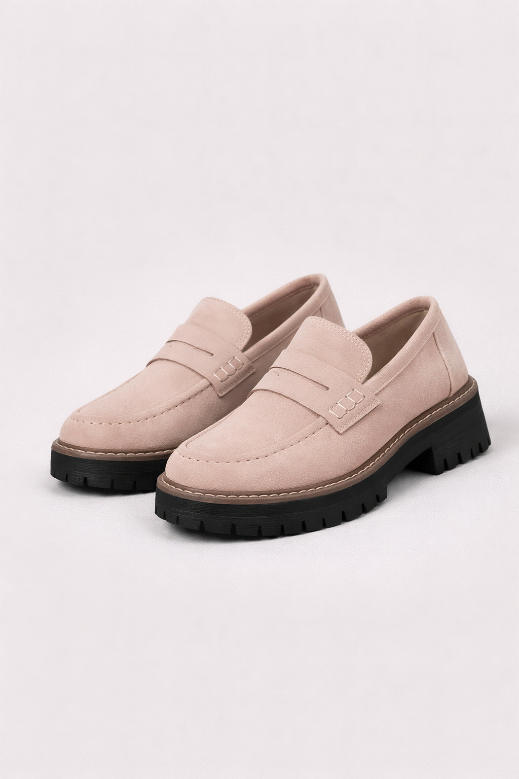 Elegant black chunky loafers for women, designed for comfortable and stylish everyday fashion.