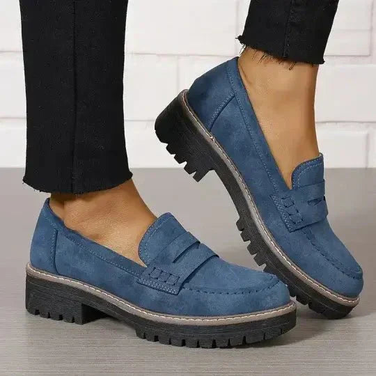 Classic yet modern women's chunky loafers, providing comfort and style for any autumn ensemble.