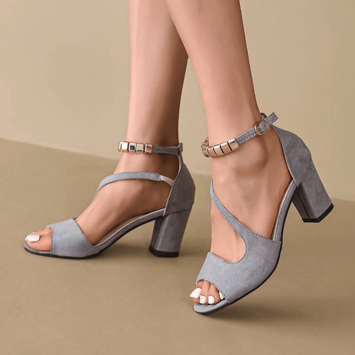 Women's stable block heel sandals, providing comfortable support & a fashionable look. Perfect chic footwear for summer events.