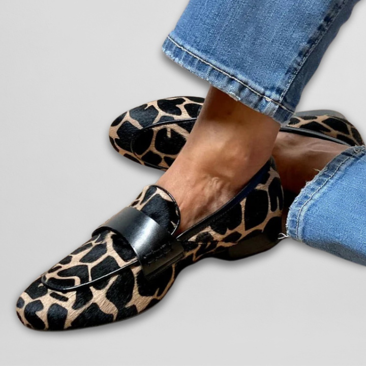 Stylish women's leopard print slip-on loafers, offering versatile and comfortable fashion footwear for ladies.