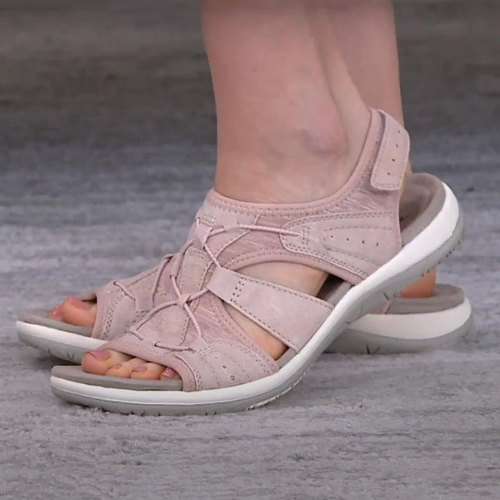 Sporty women's sandals with adjustable straps, ensuring a secure and comfortable fit for all-day wear.