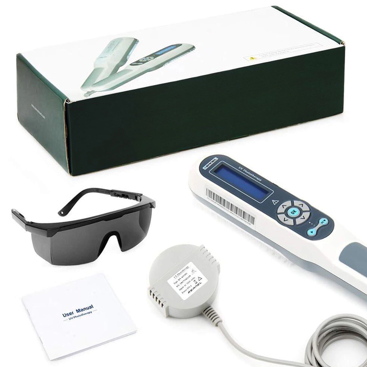 "Compact handheld UVB light therapy device for skin conditions, featuring a portable design and clear LCD display."