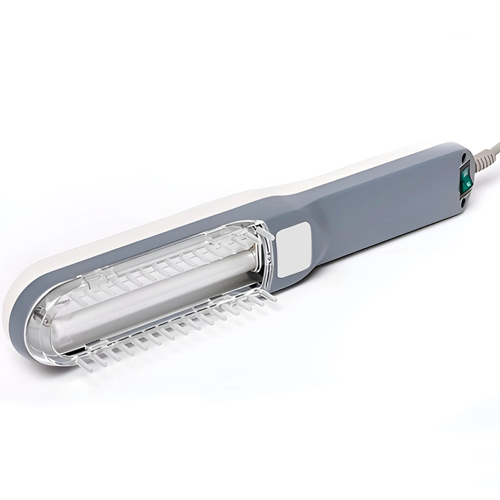 "Compact handheld UVB light therapy device for skin conditions, featuring a portable design and clear LCD display."