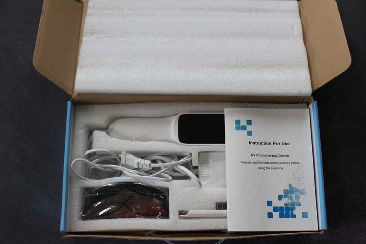 "Compact handheld UVB phototherapy lamp for psoriasis, vitiligo treatment; ideal for scalp, hands, joints; travel-friendly."