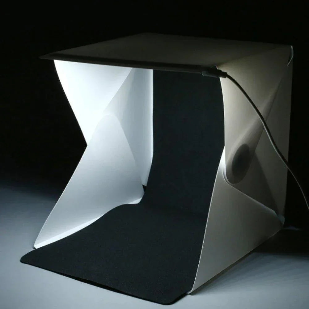 Mini photo studio with integrated LED lights, perfect for professional-grade product photography.
