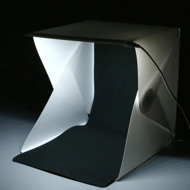 Mini photo studio with integrated LED lights, perfect for professional-grade product photography.