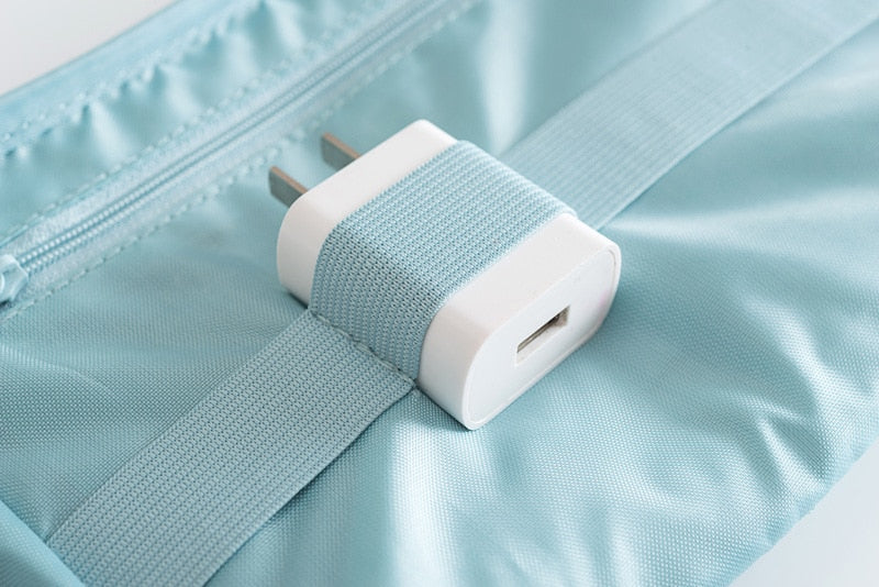 Smart cable management solution: waterproof electronics organizer for travel.