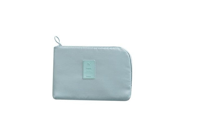 Waterproof gadget organizer bag for digital cameras & USB drives.
