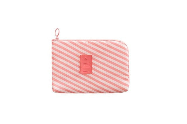 Essential waterproof tech pouch for all your travel electronics and accessories.