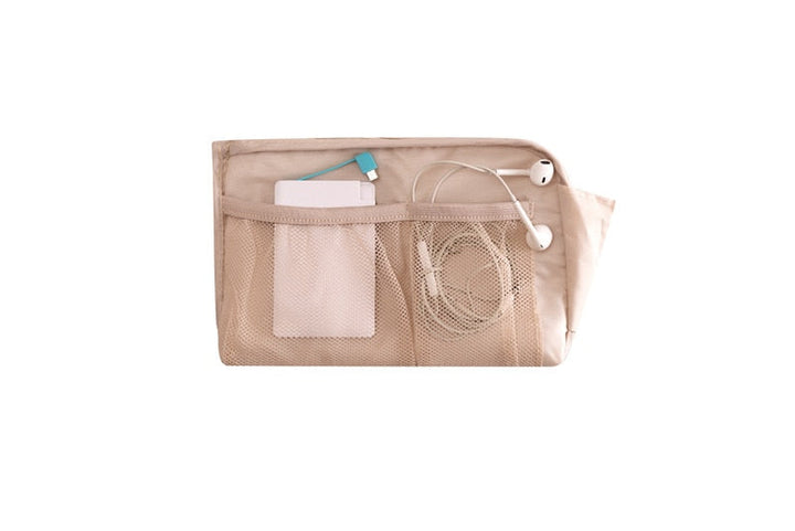 Multipurpose waterproof travel organizer for headphones, adapters, and SD cards.